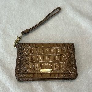 Brahmin wallet with wrist attachment, color brown on brown raised print.